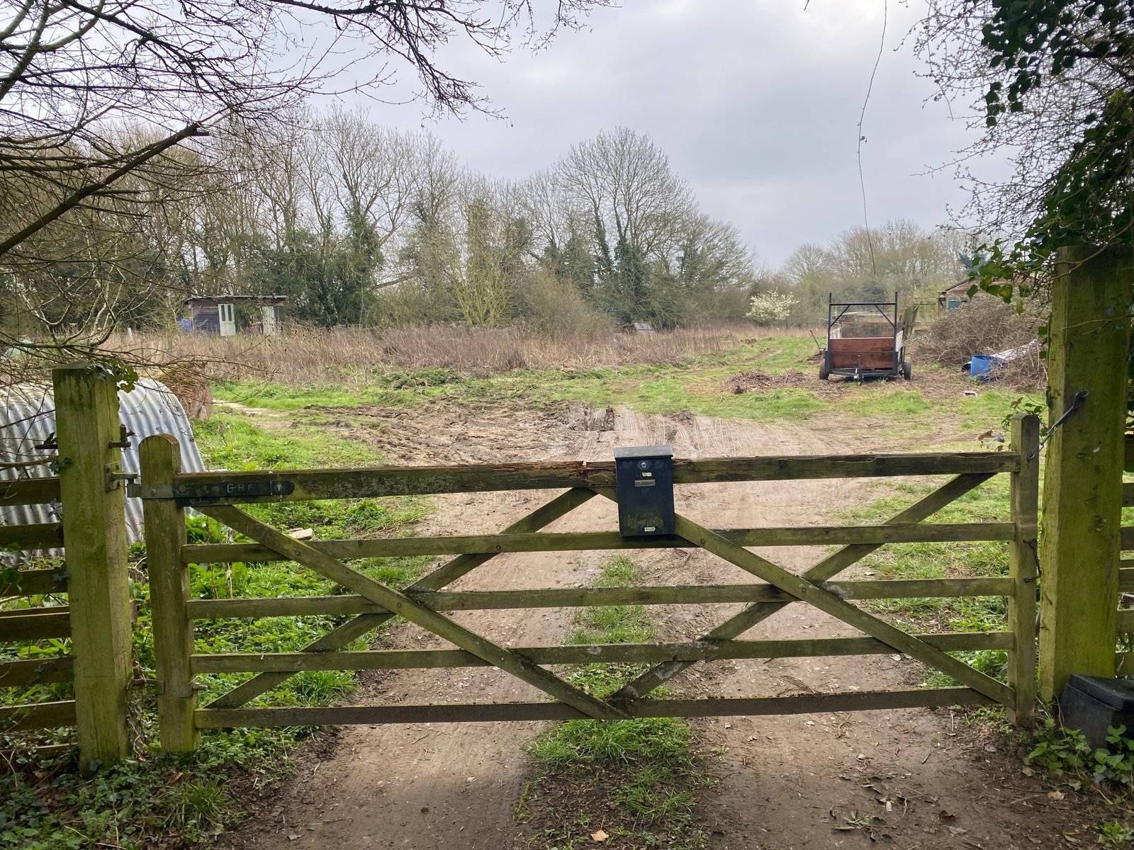 Main gate at Green Heart Farm in daylight